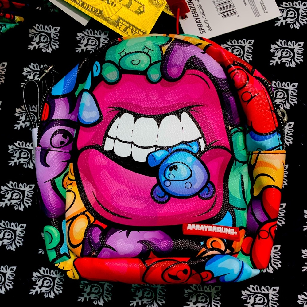 Spray ground mini backpack and pouch